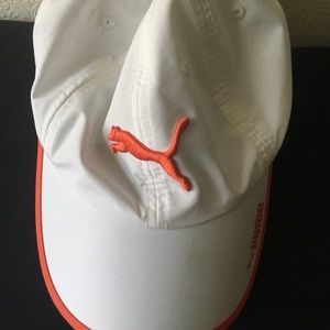 Orange and white PUMA brand baseball hat cap